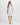 Nomia Sheer Knit Turtleneck in Ivory by THEO