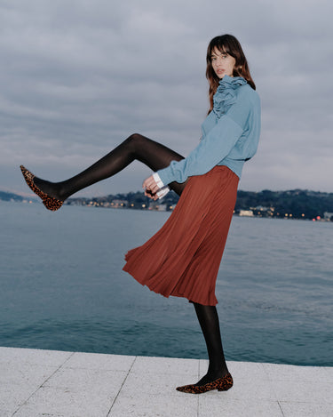 Atlas pleated midi skirt in koffee by Theo