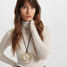nomia sheer turtleneck layering top by Theo